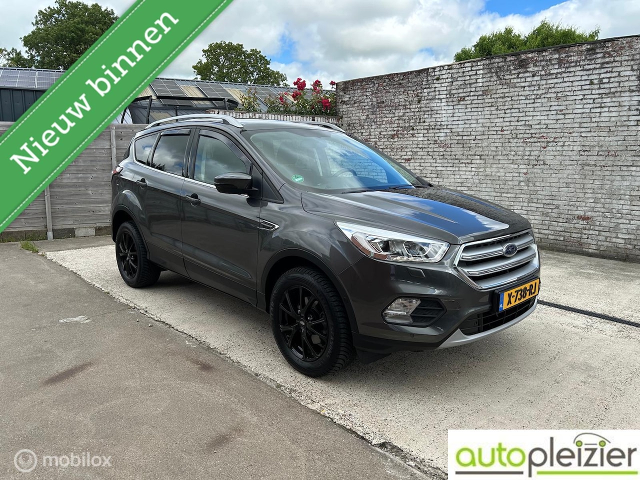 Ford Kuga - 1.5 EcoBoost Titanium|Allseason|revisie motor - AutoWereld.nl