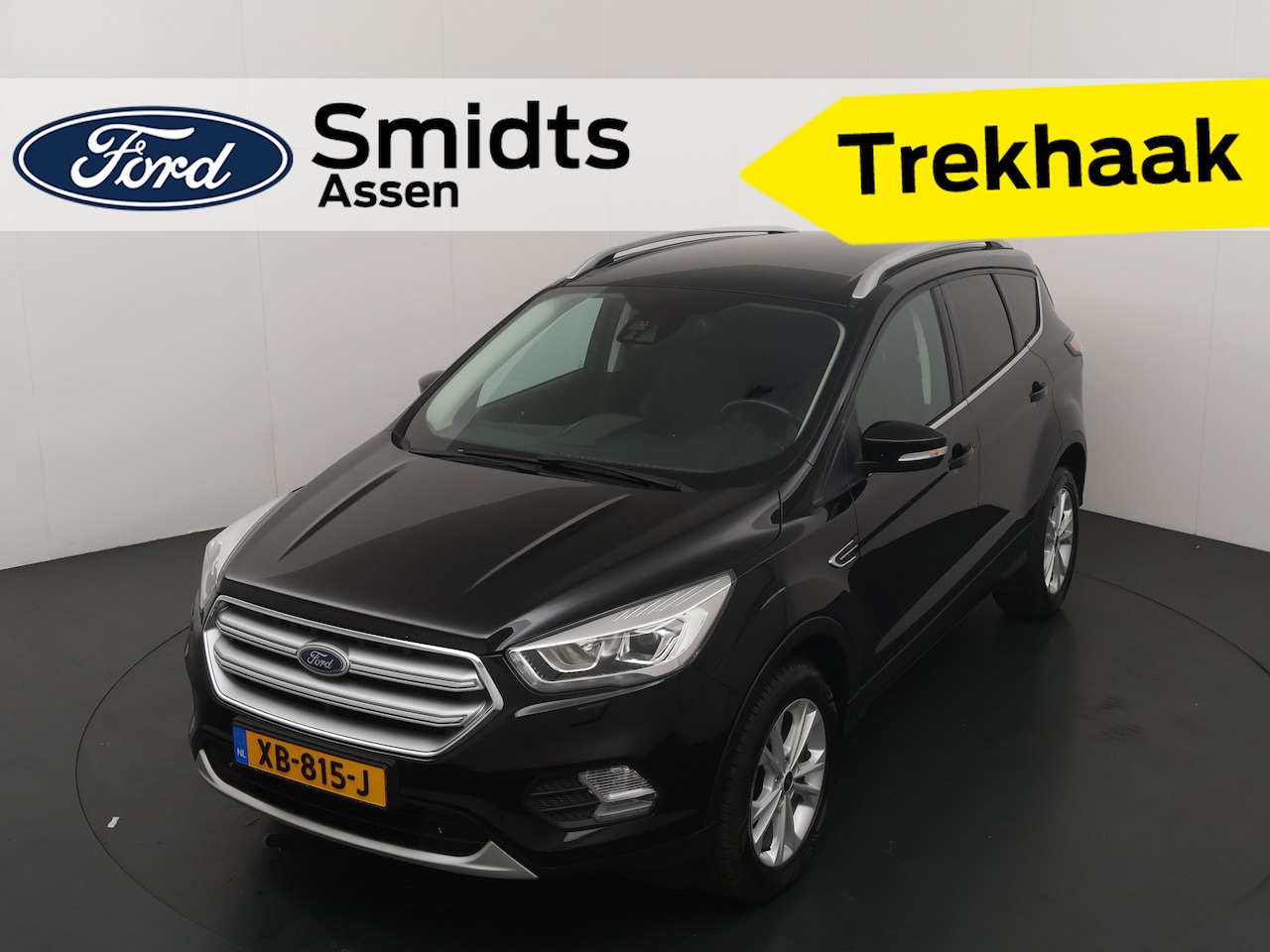 Ford Kuga - 1.5 EcoBoost Titanium | Clima | Cruise | Park. sens A | Trekhaak | Navi | Keyless | Blis | - AutoWereld.nl