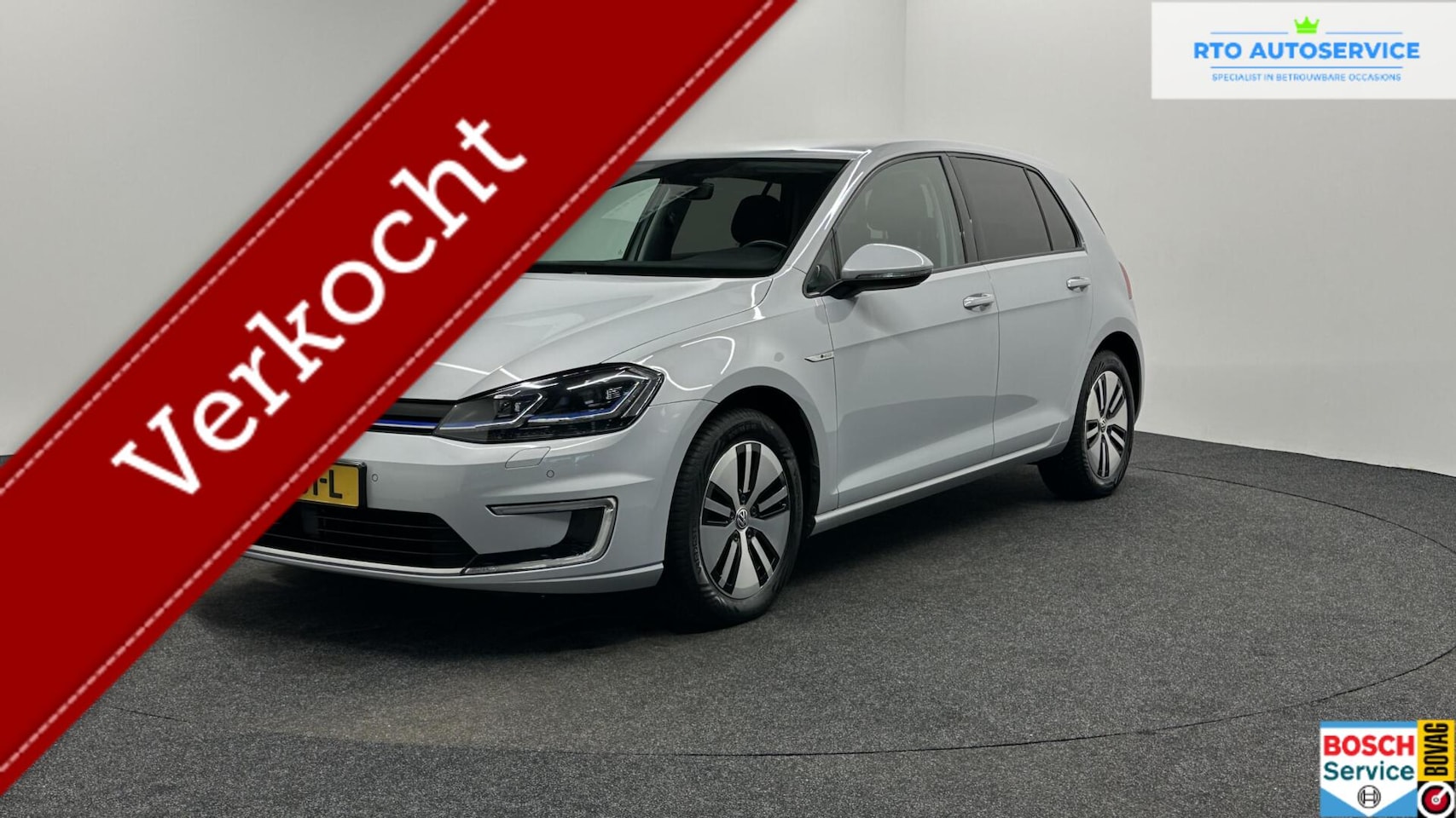 Volkswagen e-Golf - White Silver Metallic-Digitaal Display 86% SOH - AutoWereld.nl