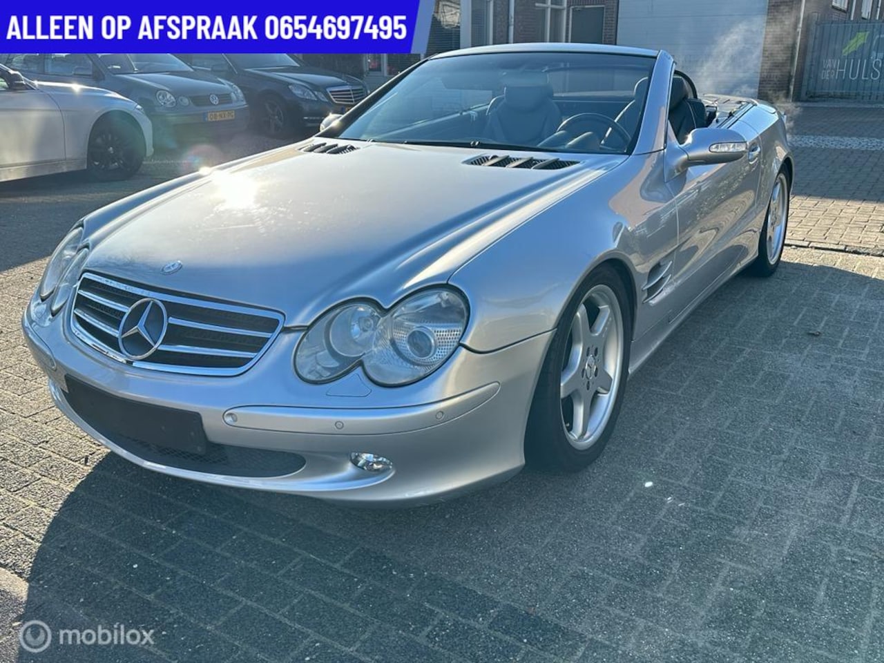 Mercedes-Benz SL-klasse Cabrio - 500 164.DKM ECC CRUISE LEDER NAVI PDC - AutoWereld.nl