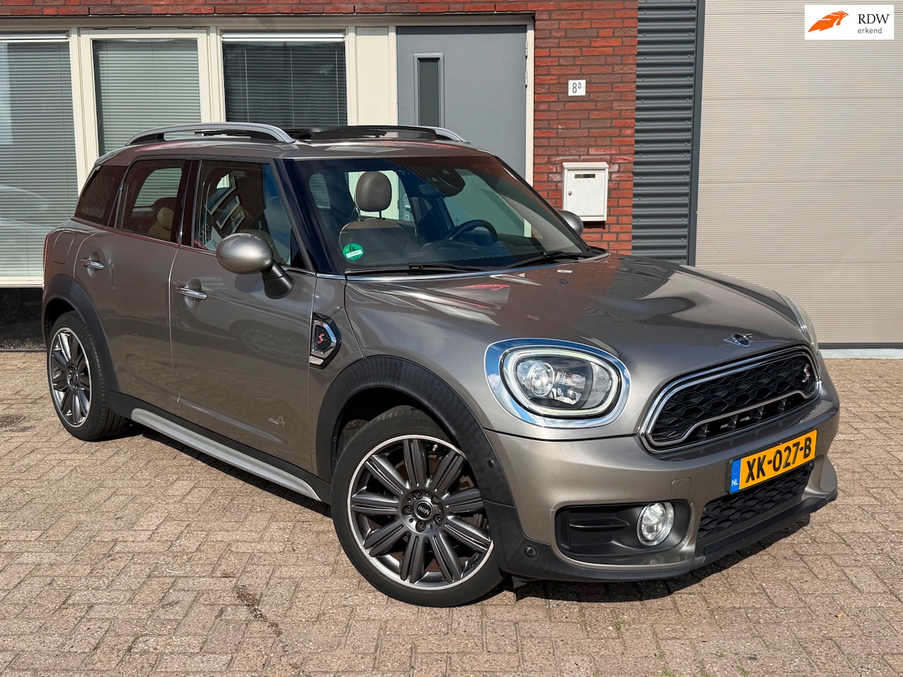 MINI Countryman - 2.0 Cooper S ALL4 Chili / Leder / Pano / Navi / PDC / Stoelverw - AutoWereld.nl