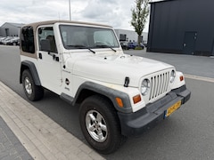 Jeep Wrangler - 2.5i Softtop Sahara Cabrio 1999 Benzine 4X4