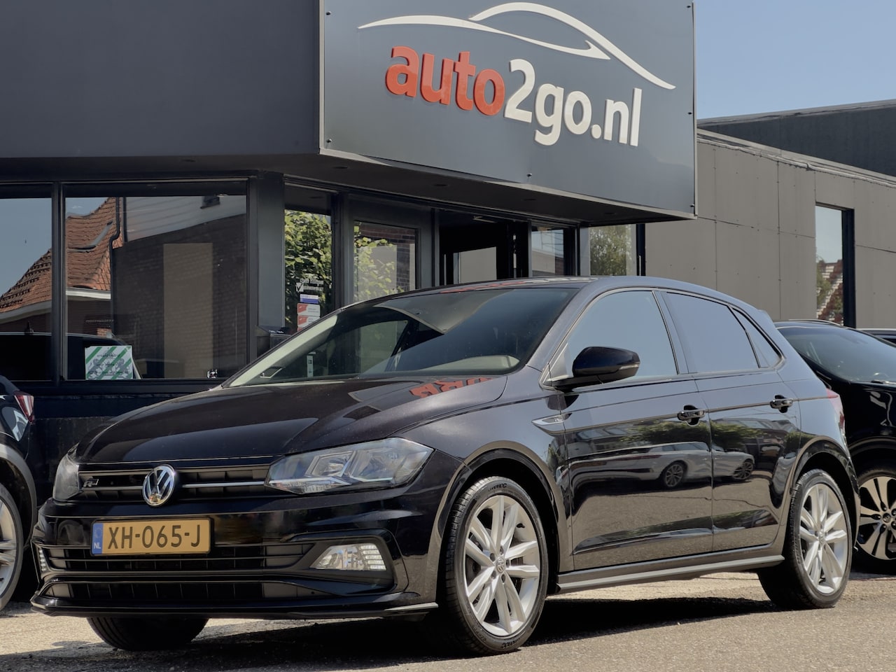 Volkswagen Polo - 1.0 TSI R-LINE HIGHLINE LEDER NAVI DIGI-DASH APPLE-CARPLAY LED LMV PDC - AutoWereld.nl