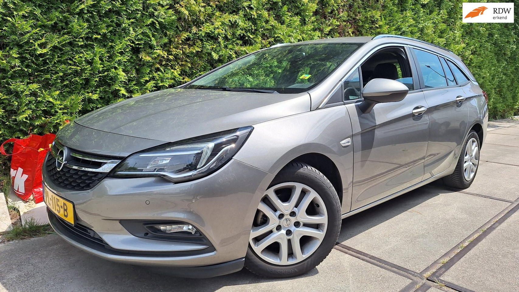 Opel Astra Sports Tourer - 1.6 CDTI Online Edition 1.6 CDTI Online Edition - AutoWereld.nl