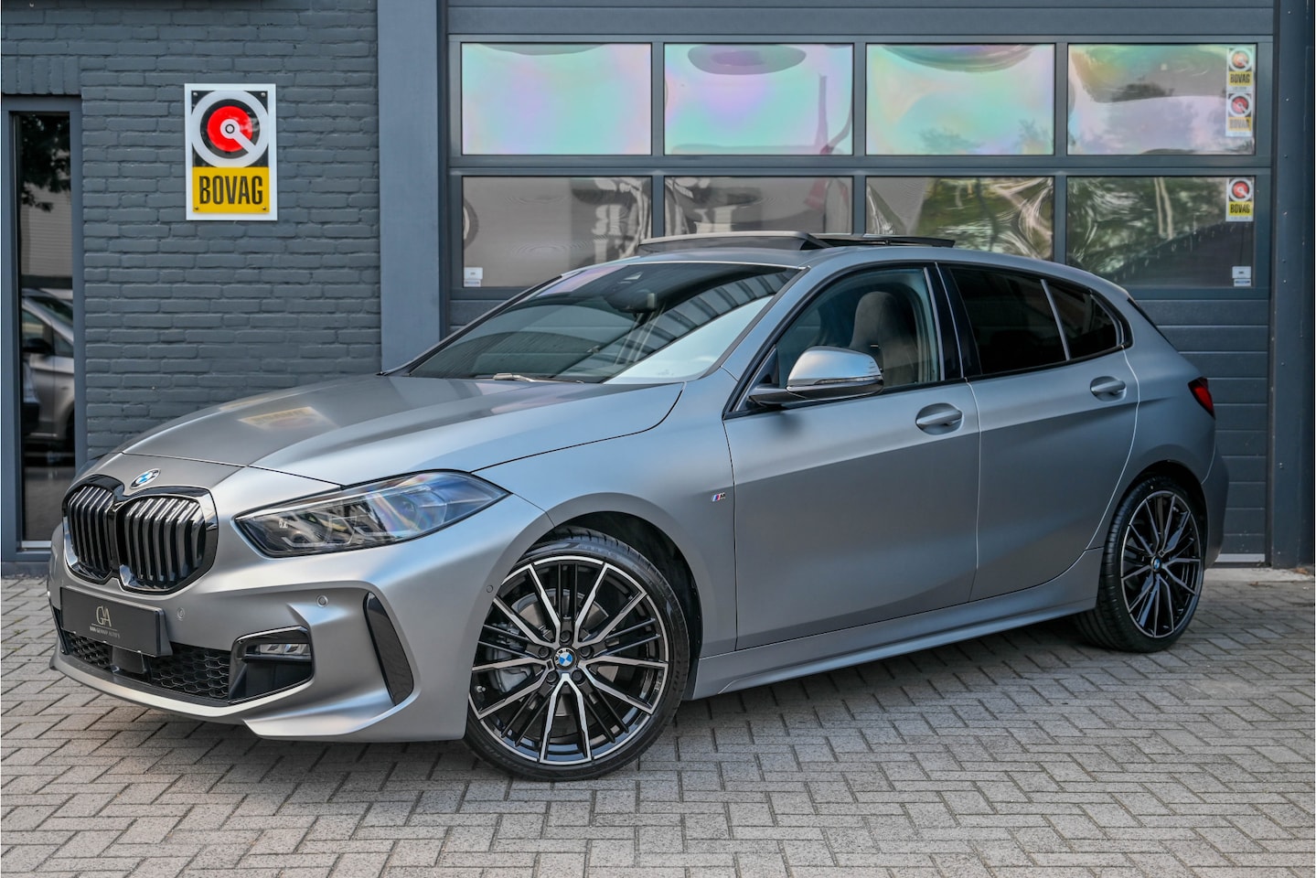BMW 1-serie - 118i M Pano,Kuipstoelen,HK,Camera - AutoWereld.nl