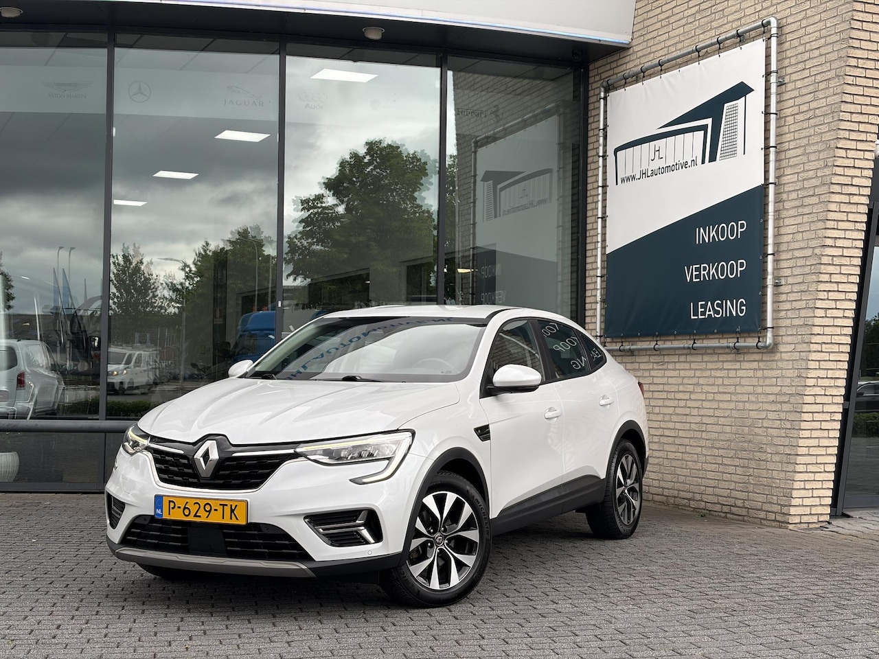 Renault Arkana - 1.6 E-Tech Hybrid*LED*CAM*KEYLESS*NAVI*CLIMA*LANE* - AutoWereld.nl
