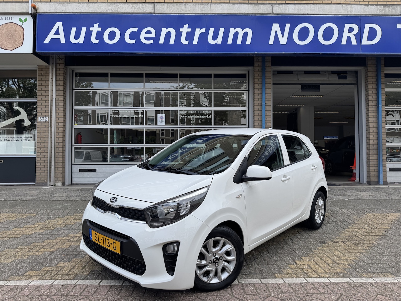 Kia Picanto - 1.0 CVVT ComfortPlusLine Navigator 66796KM! NAP | Navigatie | Apple Carplay | Achteruitrij - AutoWereld.nl