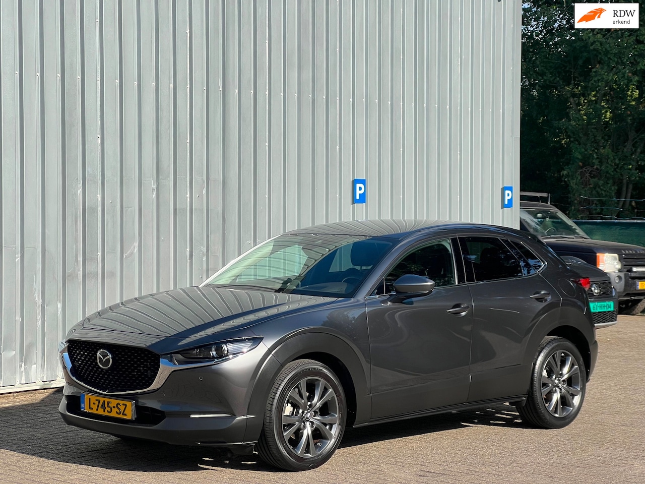 Mazda CX-30 - 2.0 e-SkyActiv-X / ALLSEASON / TREKH / STUURVERW - NL Auto! - AutoWereld.nl