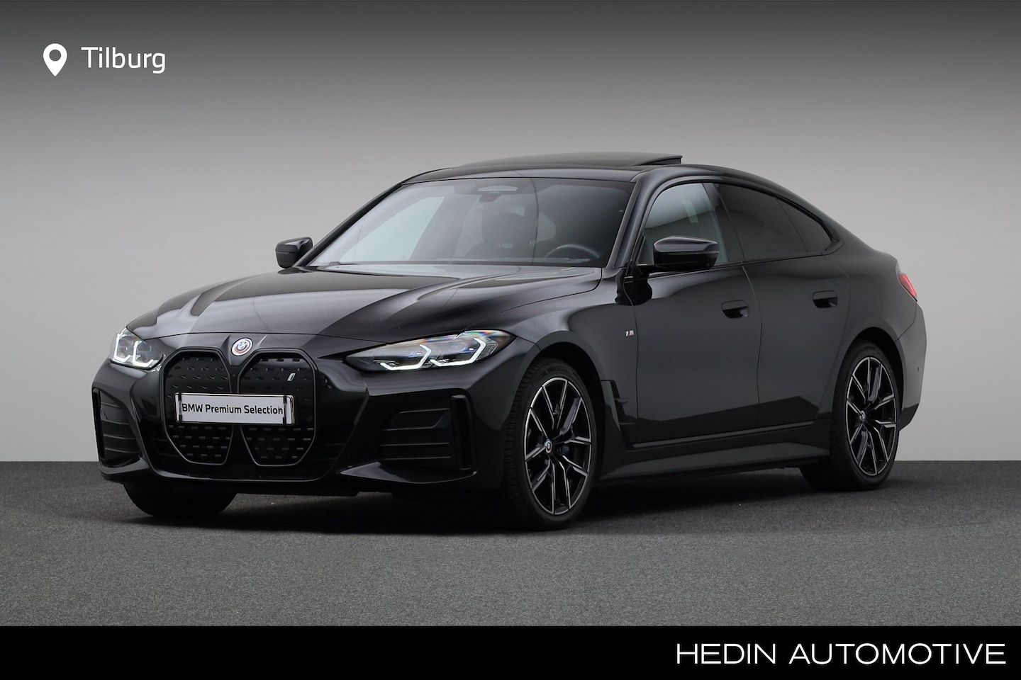 BMW i4 - eDrive40 High Executive 84 kWh | Driving Assistant Professional | Glazen schuif-/kanteldak - AutoWereld.nl