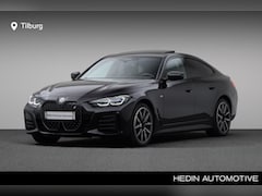 BMW i4 - eDrive40 High Executive 84 kWh | Driving Assistant Professional | Glazen schuif-/kanteldak