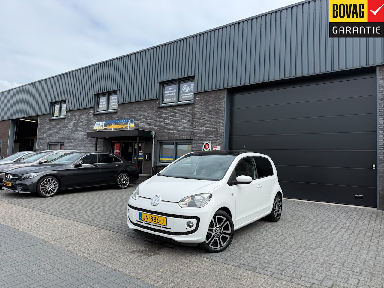 Volkswagen Up! - 1.0 high up! BlueMotion | 2E EIGENAAR | 12MND GARANTIE | PANO | CRUISE | AIRCO | NAVI | FE - AutoWereld.nl