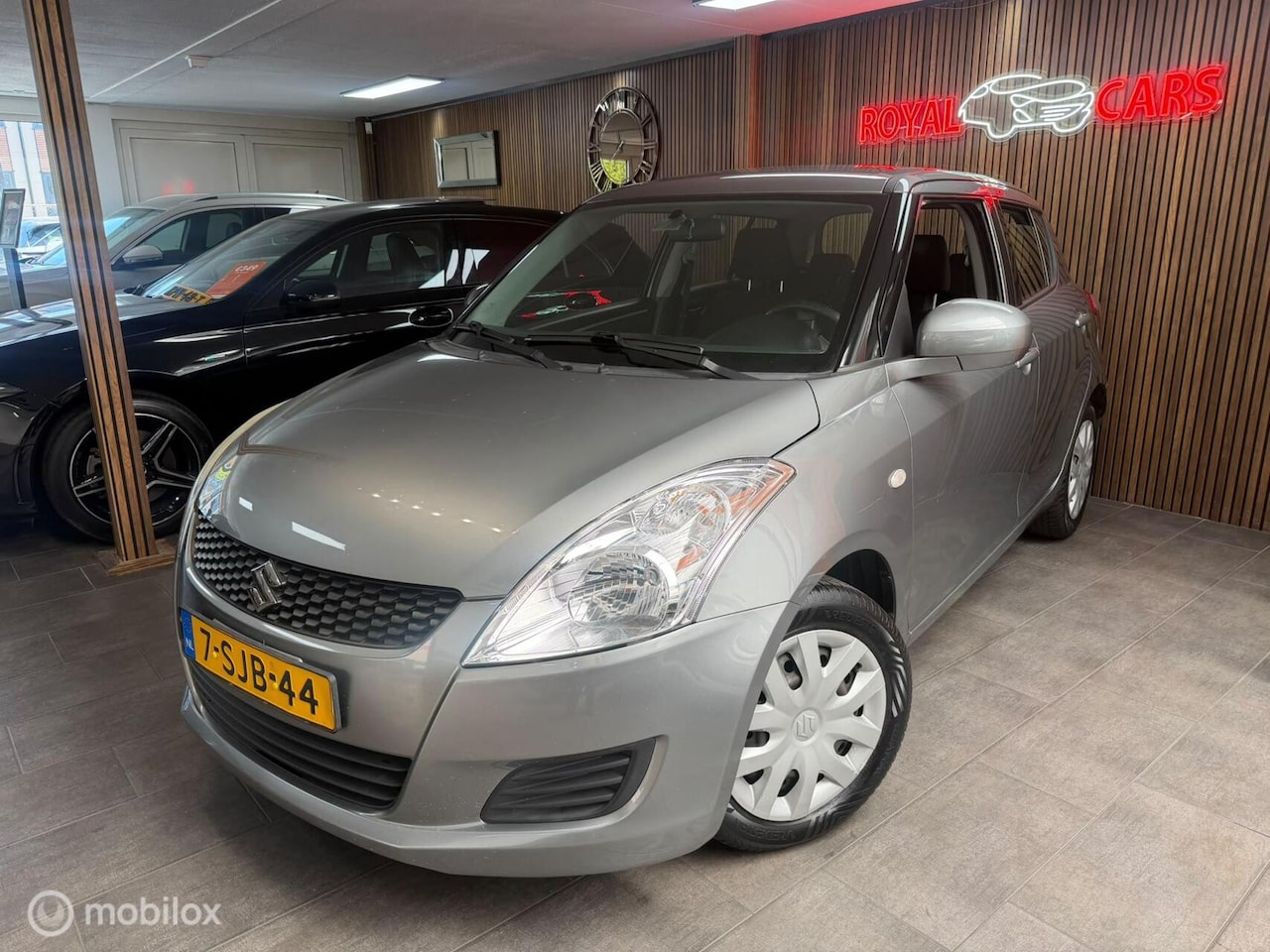 Suzuki Swift - 1.2 Bandit EASSS | Airco | Stoelverwarming - AutoWereld.nl