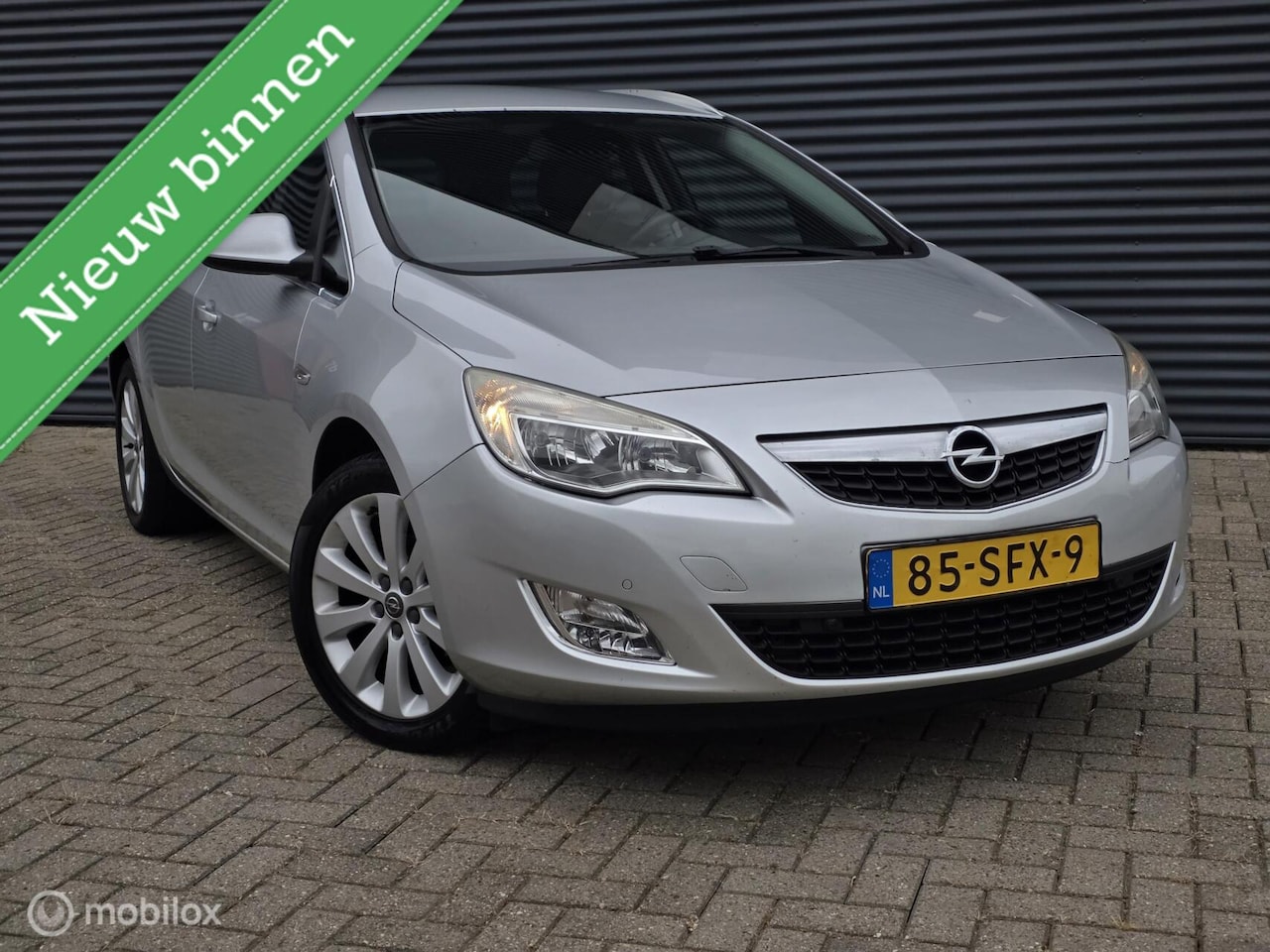 Opel Astra Sports Tourer - 1.4 Turbo Sport 1.4 Turbo Sport - AutoWereld.nl