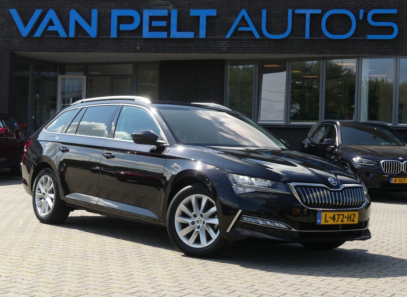 Skoda Superb Combi - 1.4 TSI iV Business Edition Plus / Canton Audio / Trekhaak - AutoWereld.nl
