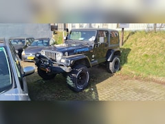 Jeep Wrangler - 4.0i Hardtop Jeep Wrangler 4.0i LPG G3 4X4 Airco lier Hardtop Hoge uitvoering