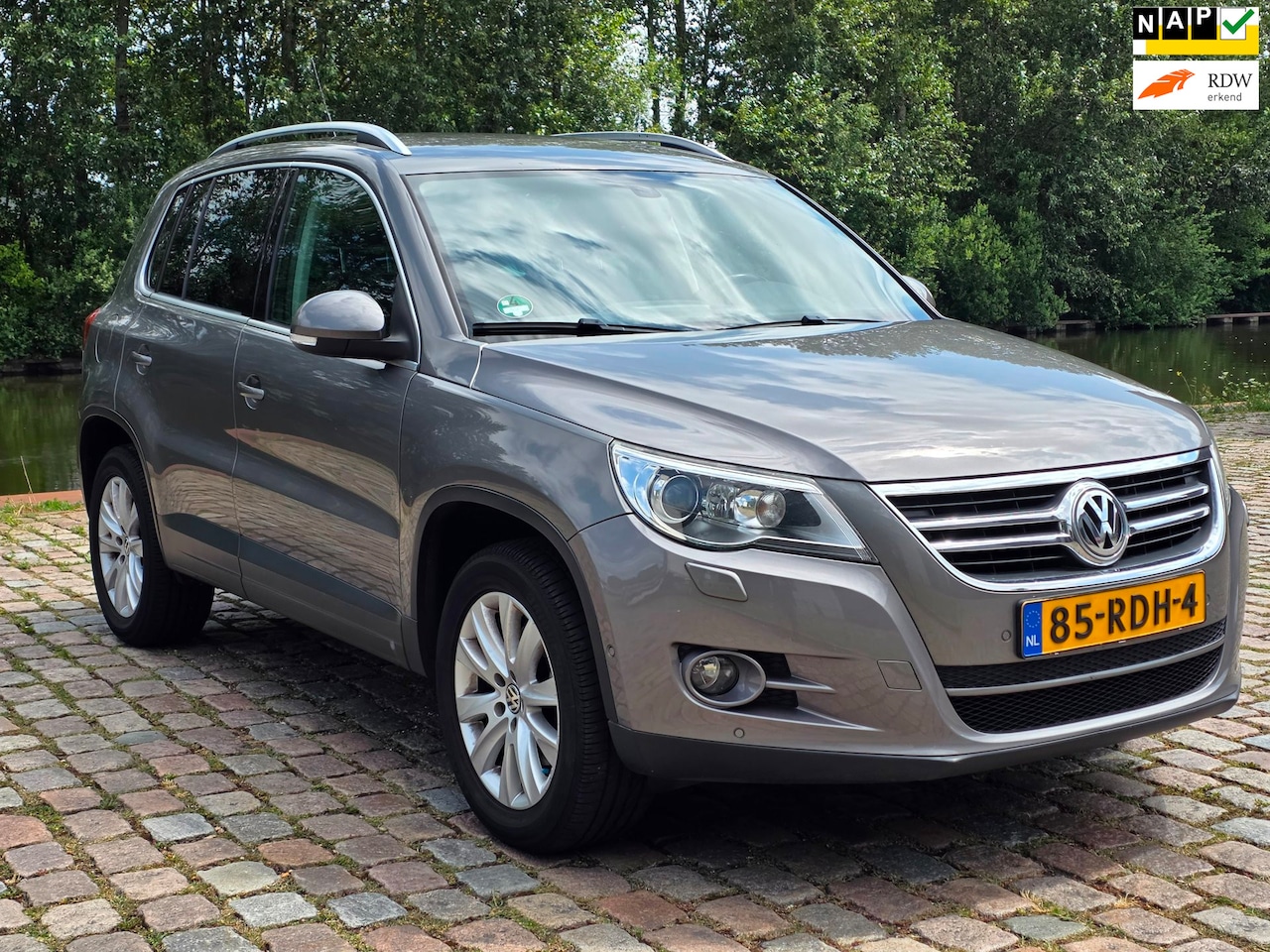 Volkswagen Tiguan - 2.0 TSI Sport&Style 4Motion Automaat volledig dealer onderhouden navigatie cruis control p - AutoWereld.nl