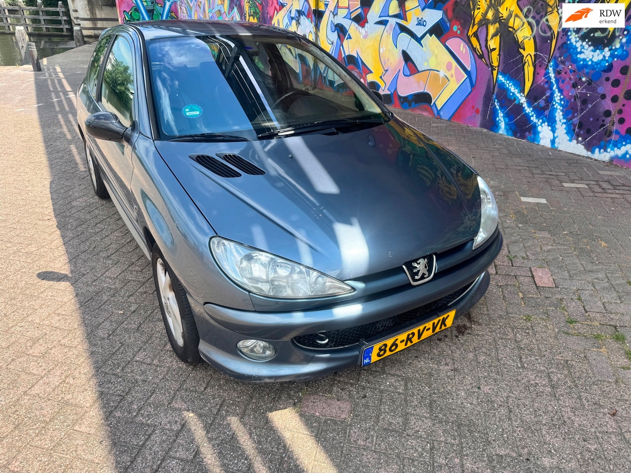 Peugeot 206 - 1.6-16V Griffe vol leer airco Remus uitlaat sport velgen zeer leuke sportieve auto bouwjaa - AutoWereld.nl