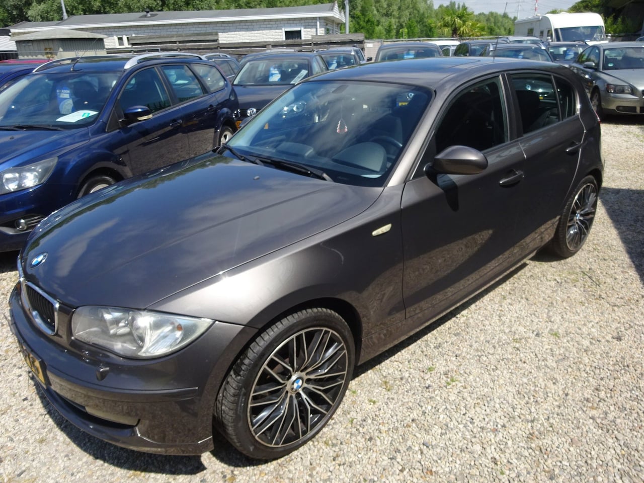 BMW 1-serie - 116i airco navigatie 6 bak schuifdak - AutoWereld.nl
