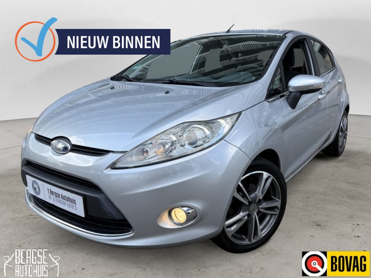 Ford Fiesta - 1.25 Titanium Cruise Clima Trekhaak Pdc - AutoWereld.nl