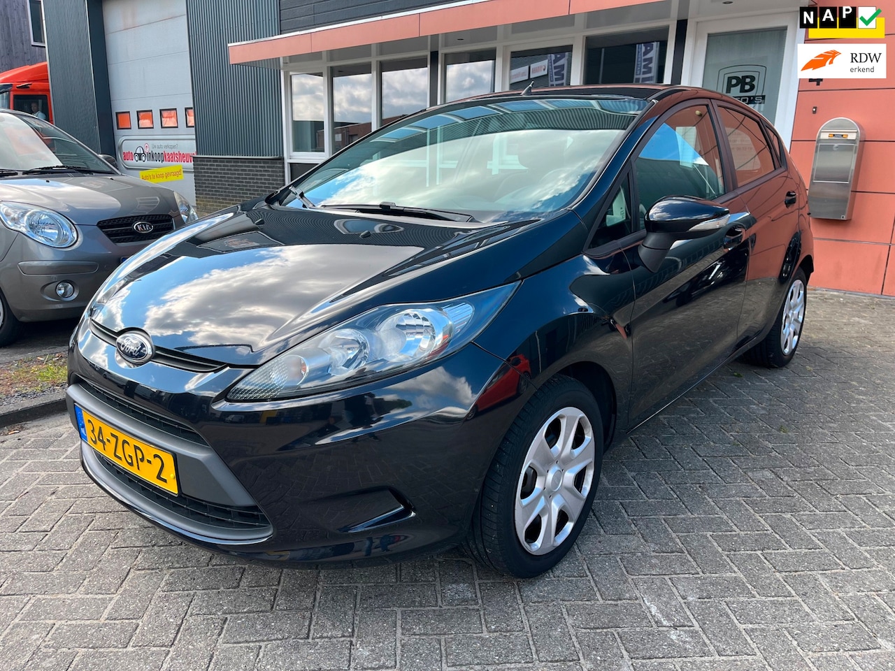 Ford Fiesta - 1.25 Champion 1e eigenaar airco - AutoWereld.nl