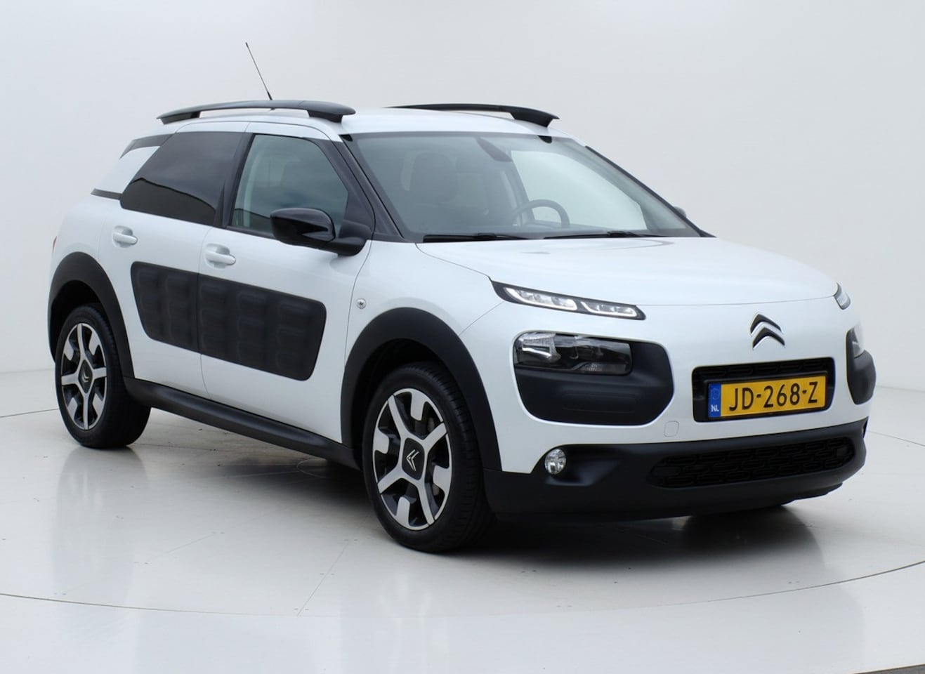 Citroën C4 Cactus - 1.2 PureTech Shine|AUT|Cruise|PDC|Trekhaak - AutoWereld.nl