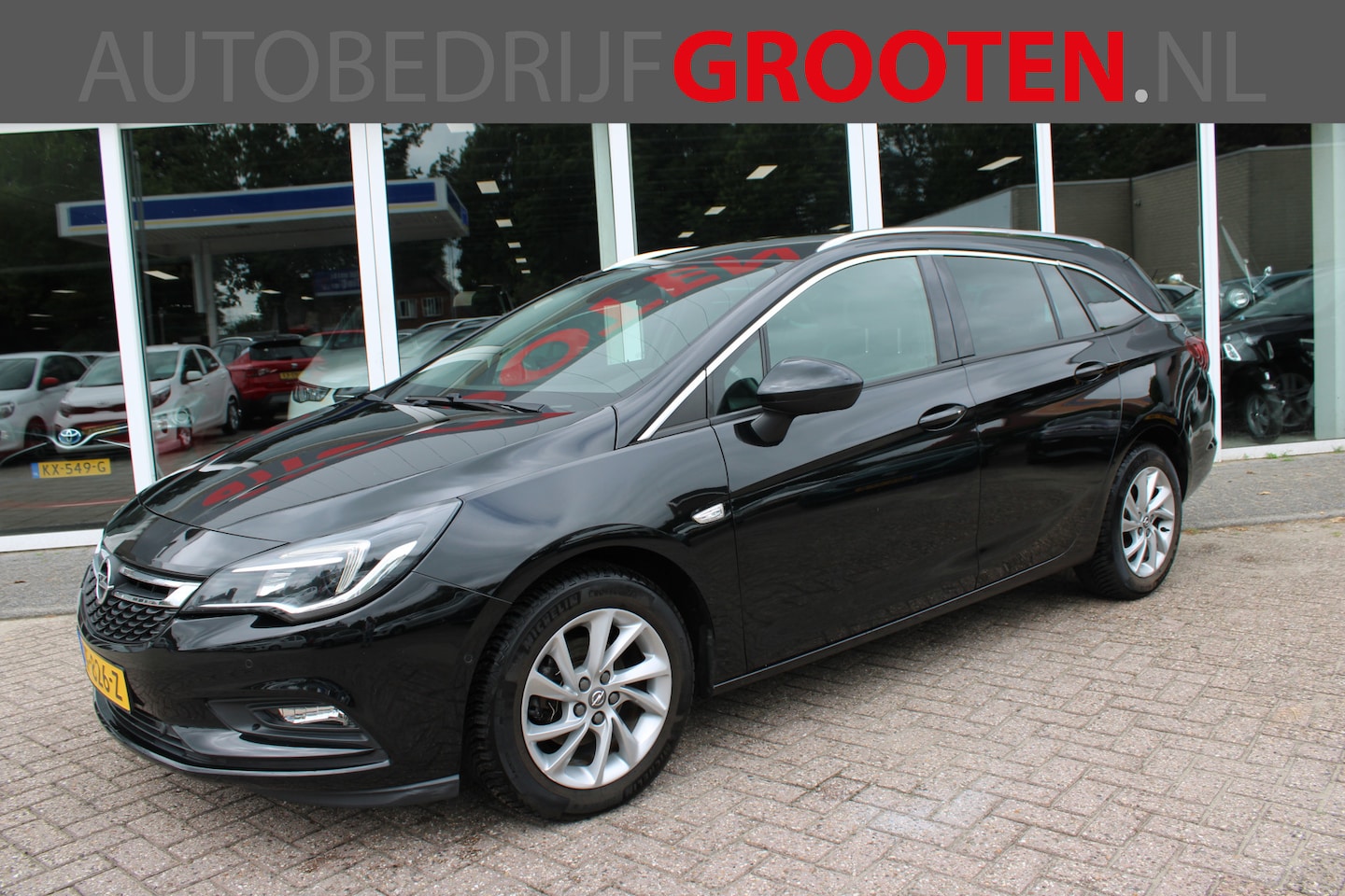 Opel Astra Sports Tourer - 1.4 Turbo Business Executive - AutoWereld.nl