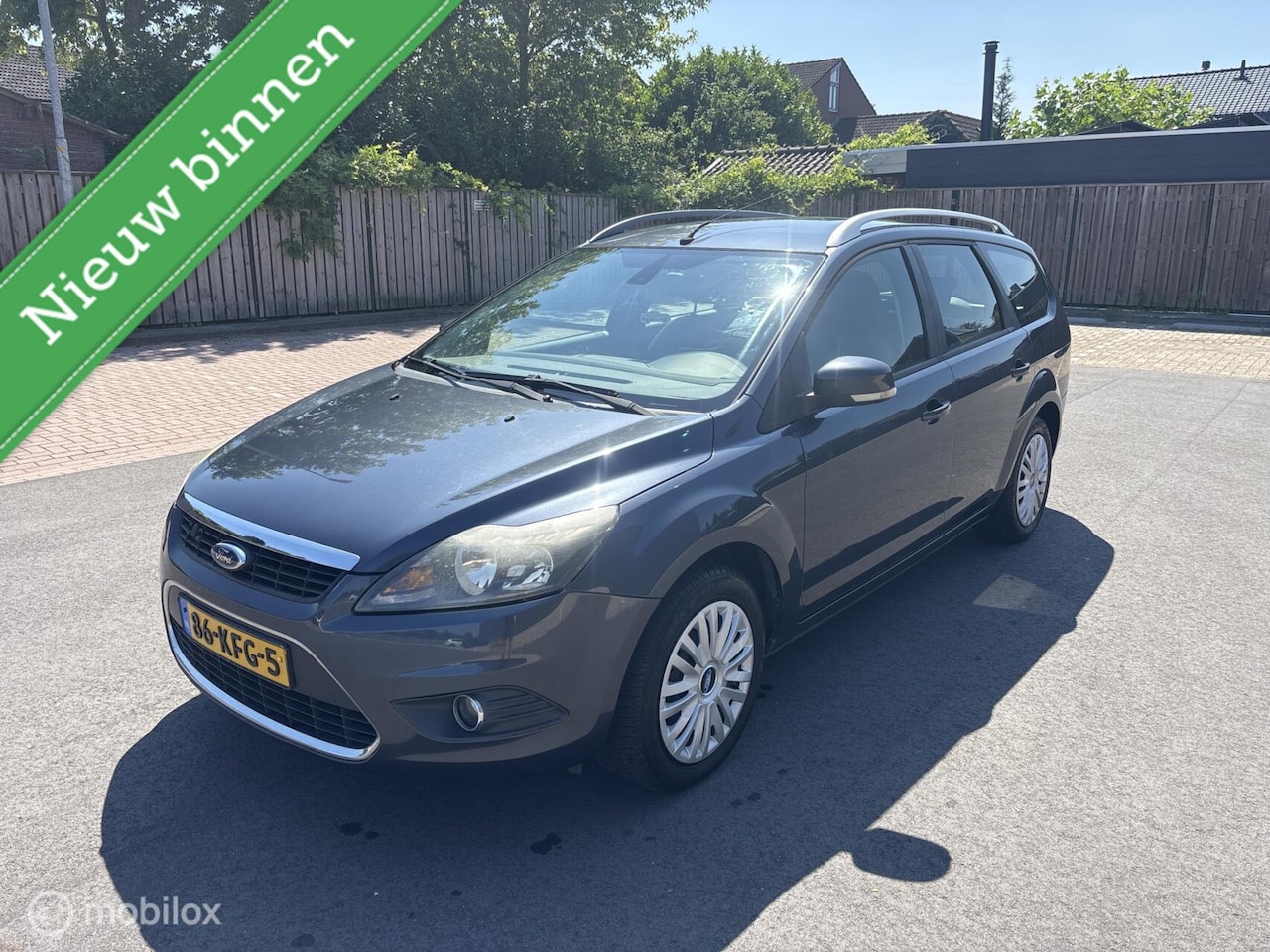 Ford Focus Wagon - 1.8 Ghia Flexi Fuel 1.8 Ghia Flexi Fuel - AutoWereld.nl