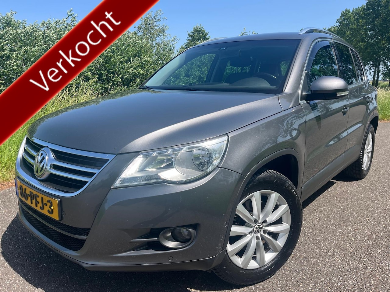 Volkswagen Tiguan - 1.4 TSI Sport&Style - AutoWereld.nl
