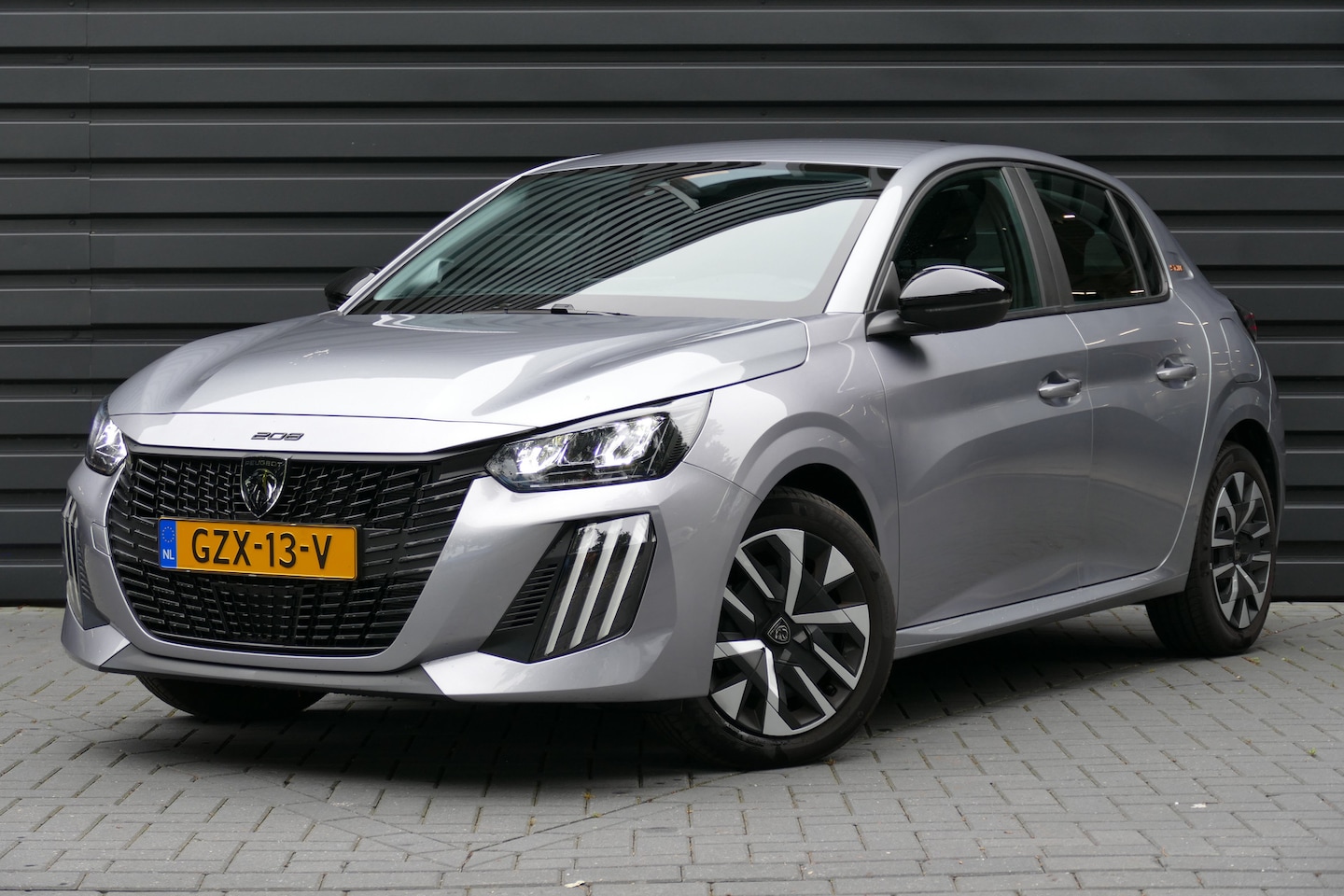 Peugeot 208 - 1.2 PURETECH 75PK STYLE / NAVI / AIRCO / LED / PDC / BLUETOOTH / CRUISECONTROL / 1E EIGENA - AutoWereld.nl