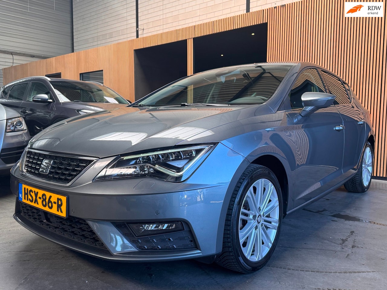 SEAT Leon ST - 1.4 TSI X-PERIENCE Airco|Carplay|Keyless|Navi|Cruise - AutoWereld.nl