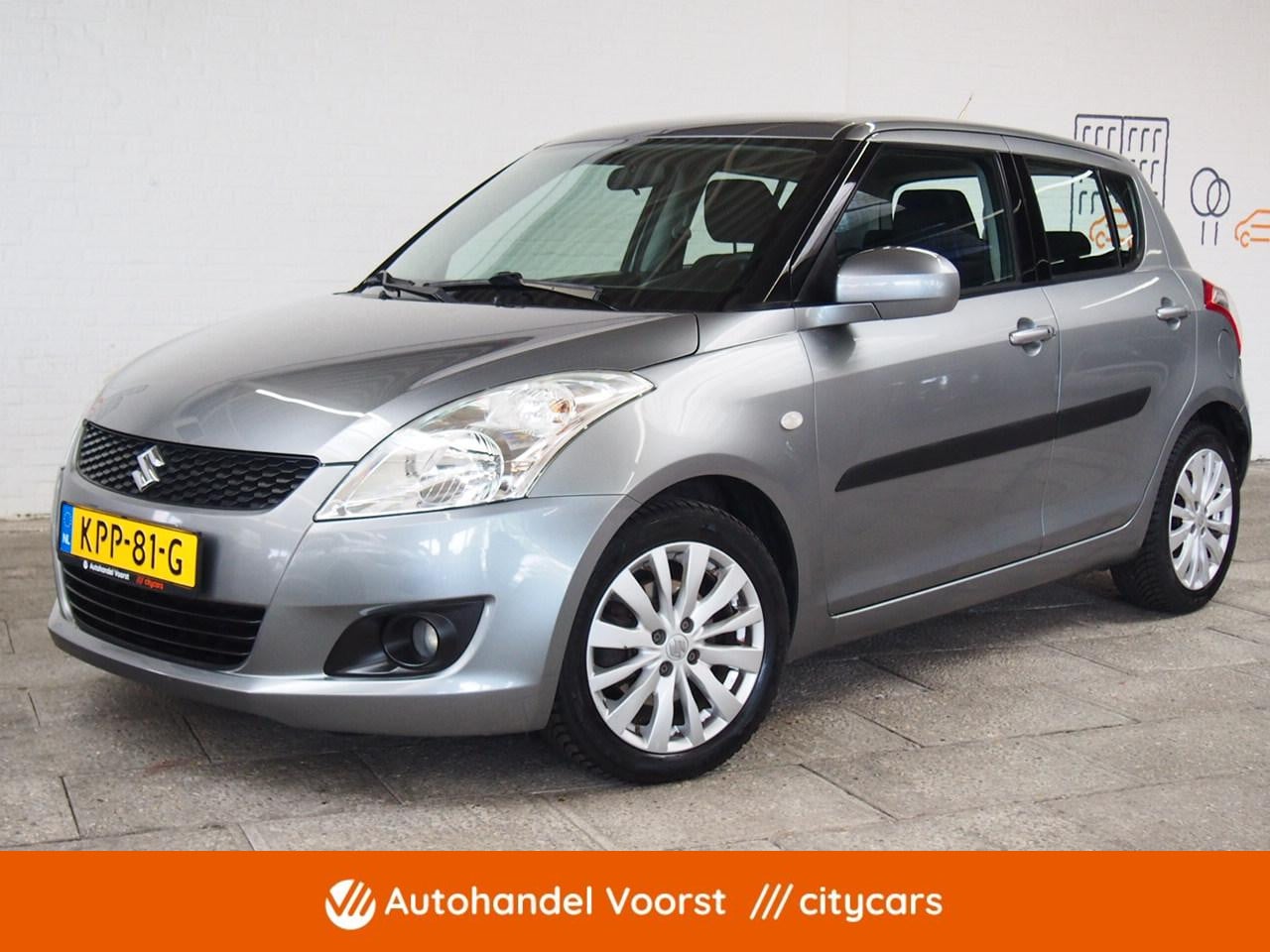 Suzuki Swift - 1.2 Exclusive EASSS Cruise Keyless (APK:Nieuw) Incl.Garantie - AutoWereld.nl