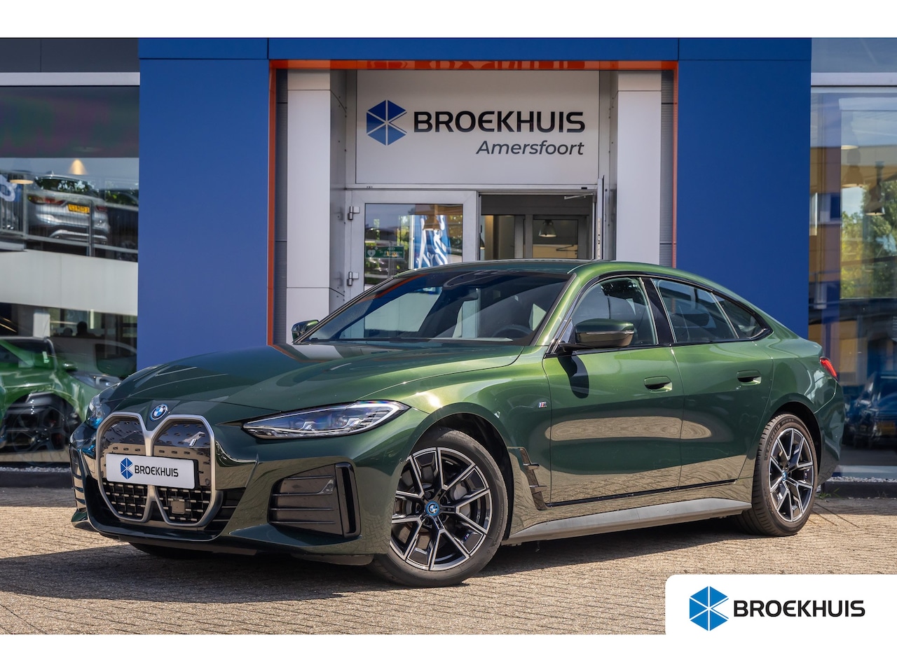 BMW i4 - eDrive35 High Executive 70 kWh | M-sport | Cruise adaptief | Camera | Elektrisch bedienbar - AutoWereld.nl