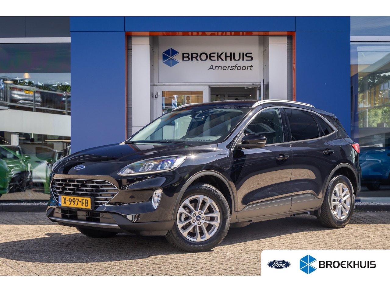 Ford Kuga - 2.5 PHEV Titanium | Trekhaak | Keyless entry/Start | Achteruitrijcamera | Stoel/Stuurwiel - AutoWereld.nl