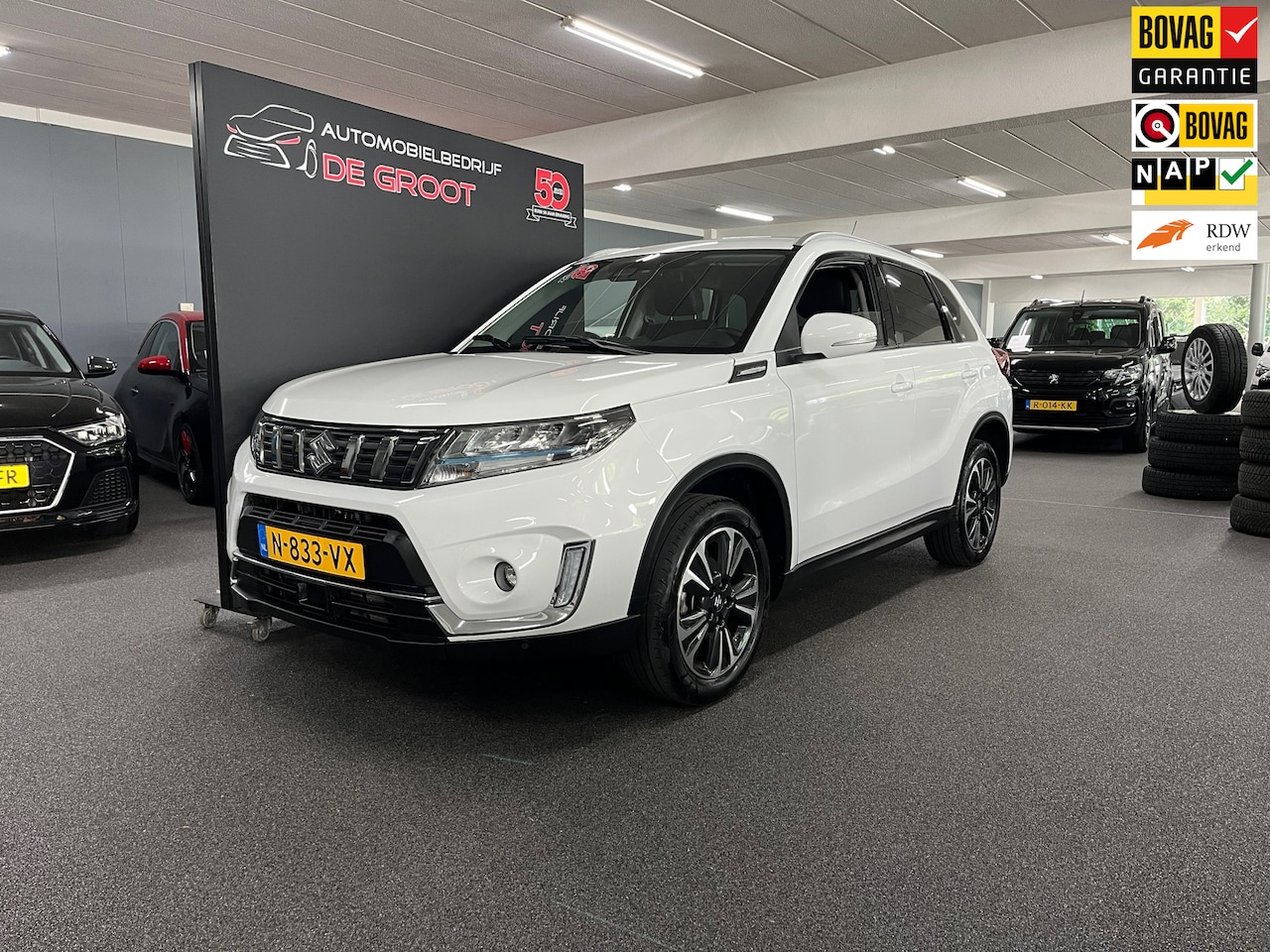 Suzuki Vitara - 1.4 Boosterjet Style Smart Hybrid / NL auto / Eerste eigenaar /Navigatie - AutoWereld.nl