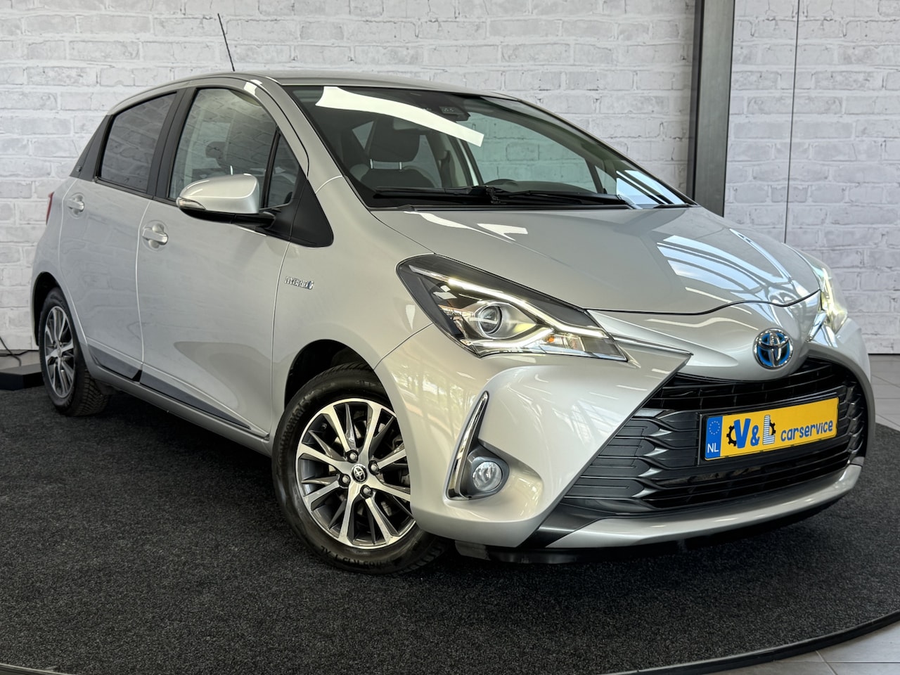 Toyota Yaris - 1.5 Hybrid Y20 Keyless Navi Automaat - AutoWereld.nl