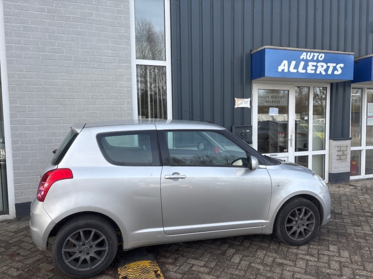 Suzuki Swift - 1.3 Exclusive 1.3 EXCLUSIVE - AutoWereld.nl