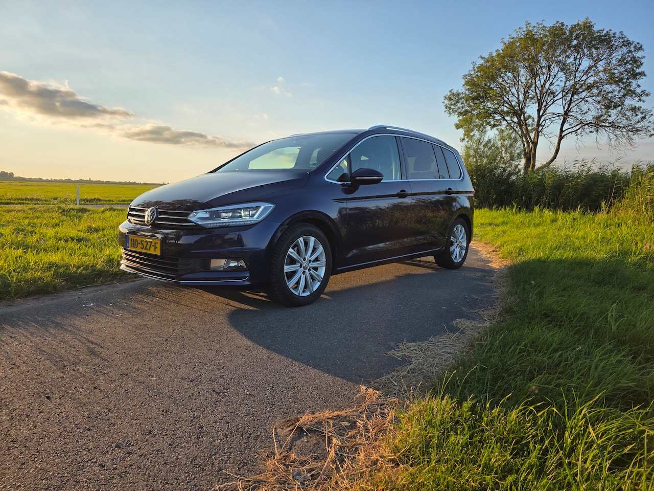 Volkswagen Touran - 1.4 TSI Highline 7p Full option - AutoWereld.nl