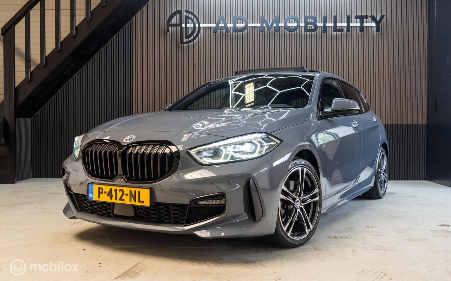 BMW 1-serie - 118i M Sport Edition PANO KUIPSTOELEN CAMERA - AutoWereld.nl