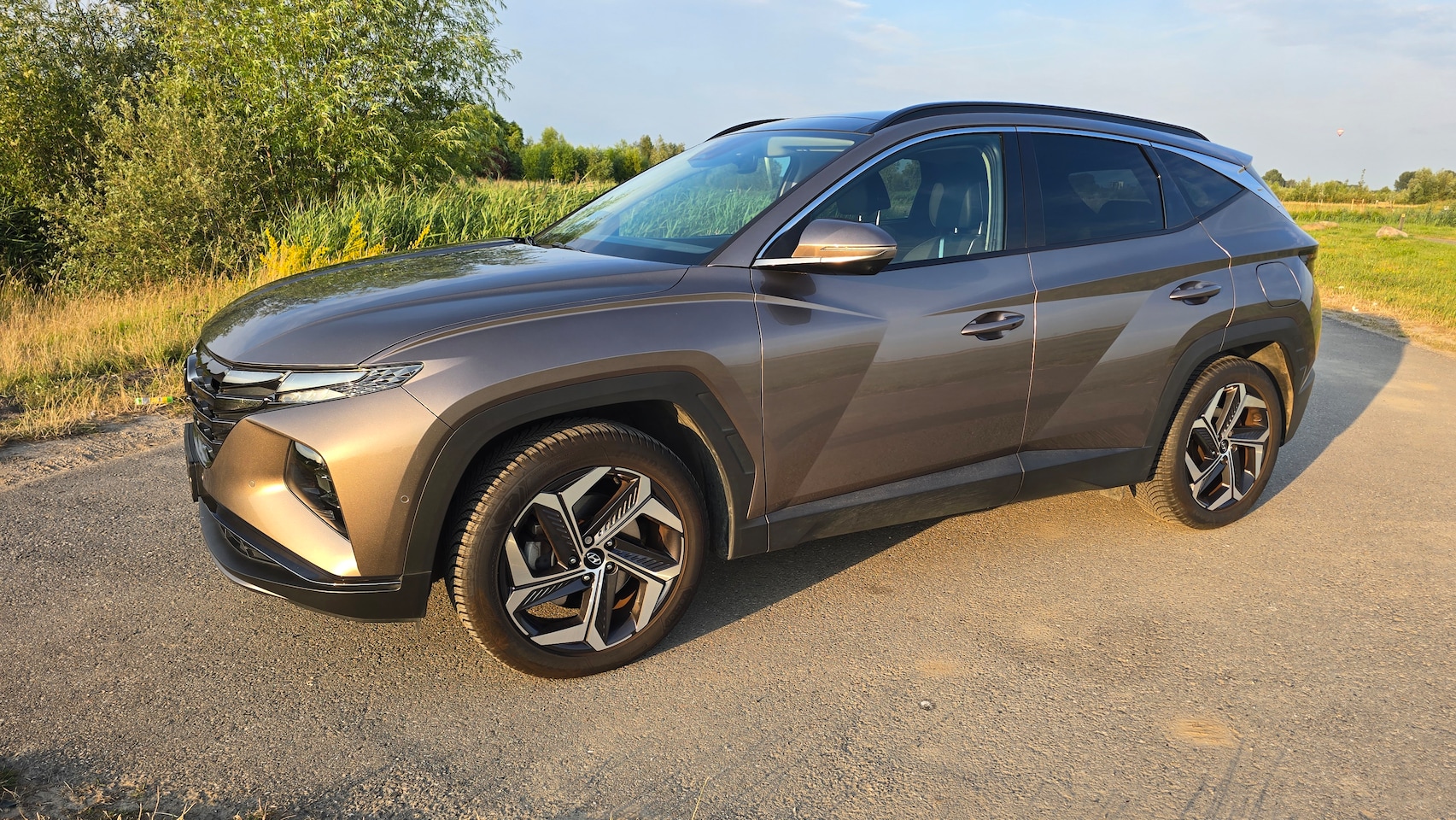 Hyundai Tucson - 1.6 T-GDI HEV Premium Sky - AutoWereld.nl