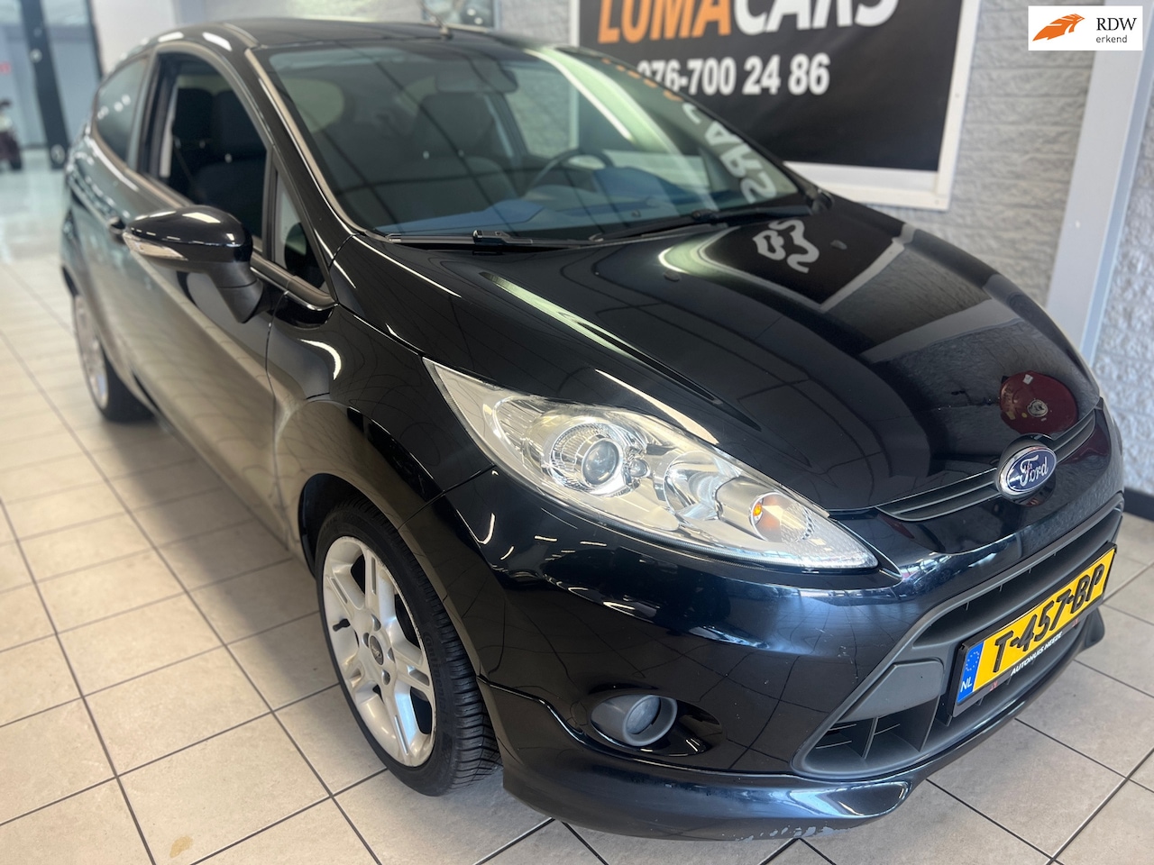 Ford Fiesta - 1.4 Ghia 1.4 Ghia - AutoWereld.nl