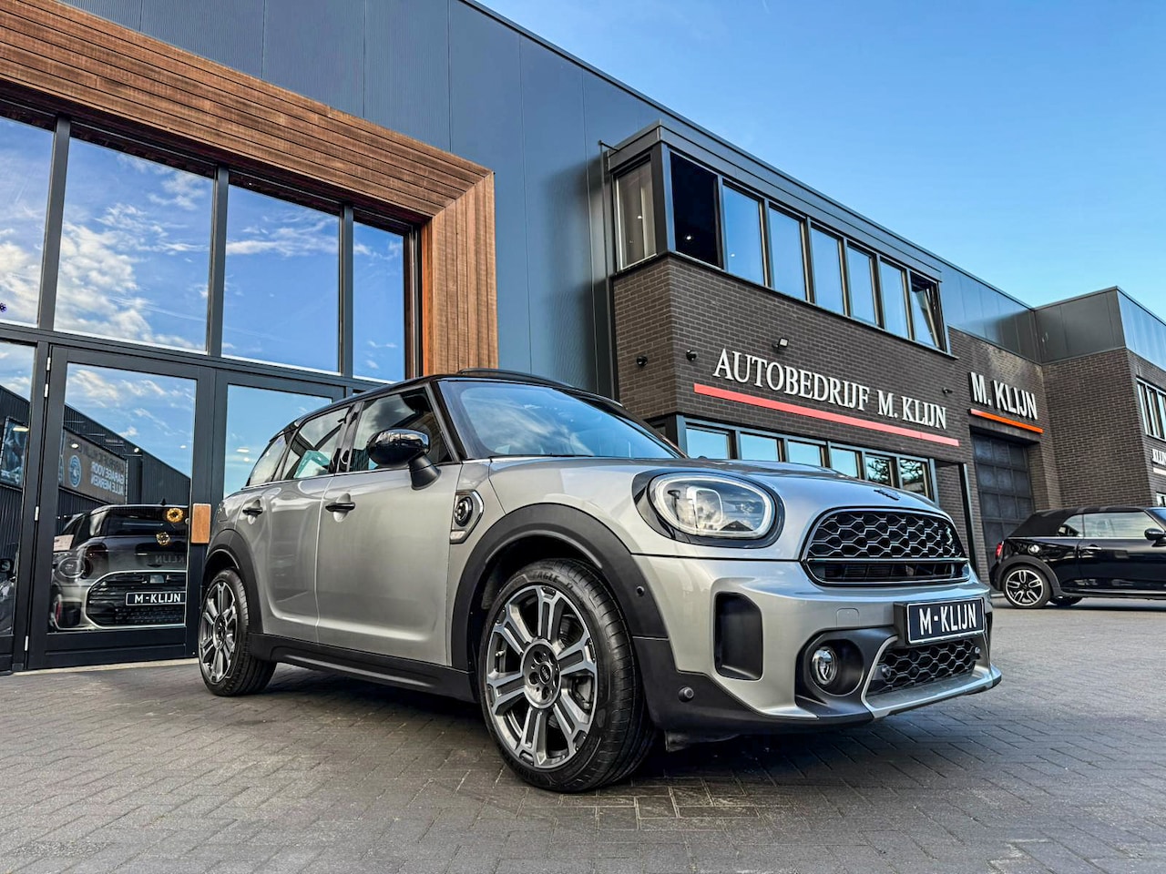 MINI Countryman - 1.5 Cooper S E ALL4 MINI Yours 220pk/Leer/Memory/Pano/Camera/Hk/Btw - AutoWereld.nl