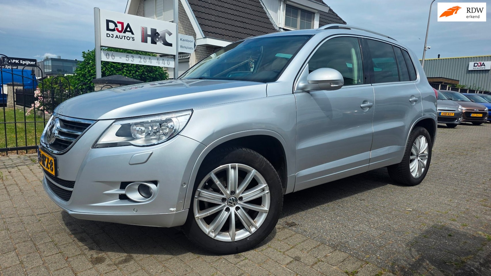 Volkswagen Tiguan - 2.0 TSI Sport&Style 4Motion - AutoWereld.nl