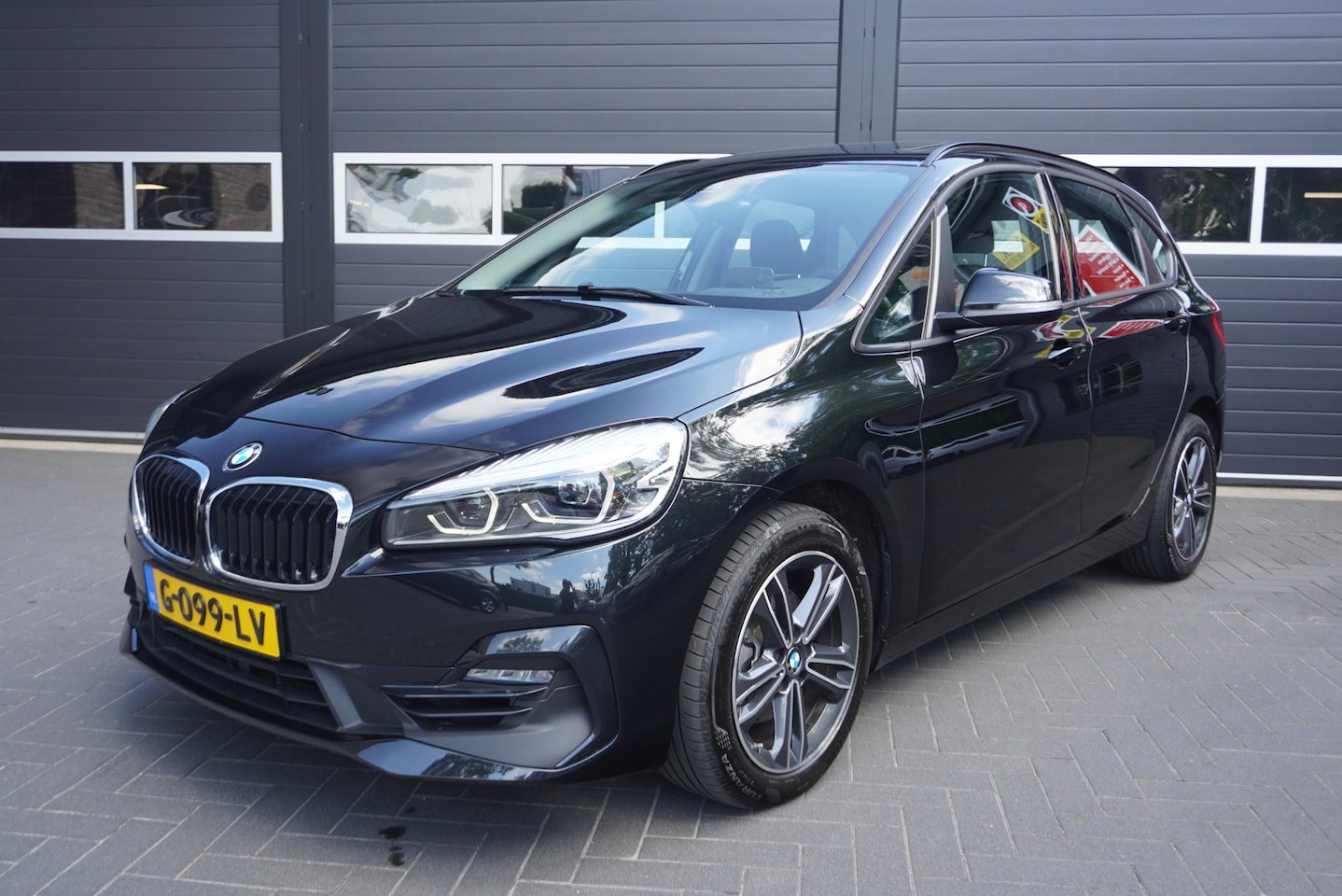 BMW 2-serie Active Tourer - 218i Executive Edition Aut/Elek.Panodak/Navi/Cruise/Climate Control/Park.sensoren - AutoWereld.nl