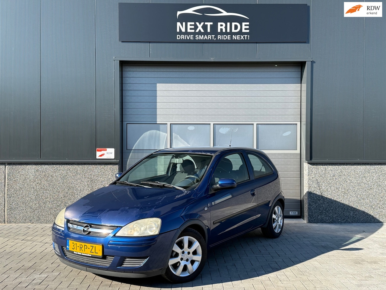 Opel Corsa - 1.2-16V Full Rhythm|Airco|Opel Dakdragers|Dealeronderhouden|1e Eigenaar| - AutoWereld.nl