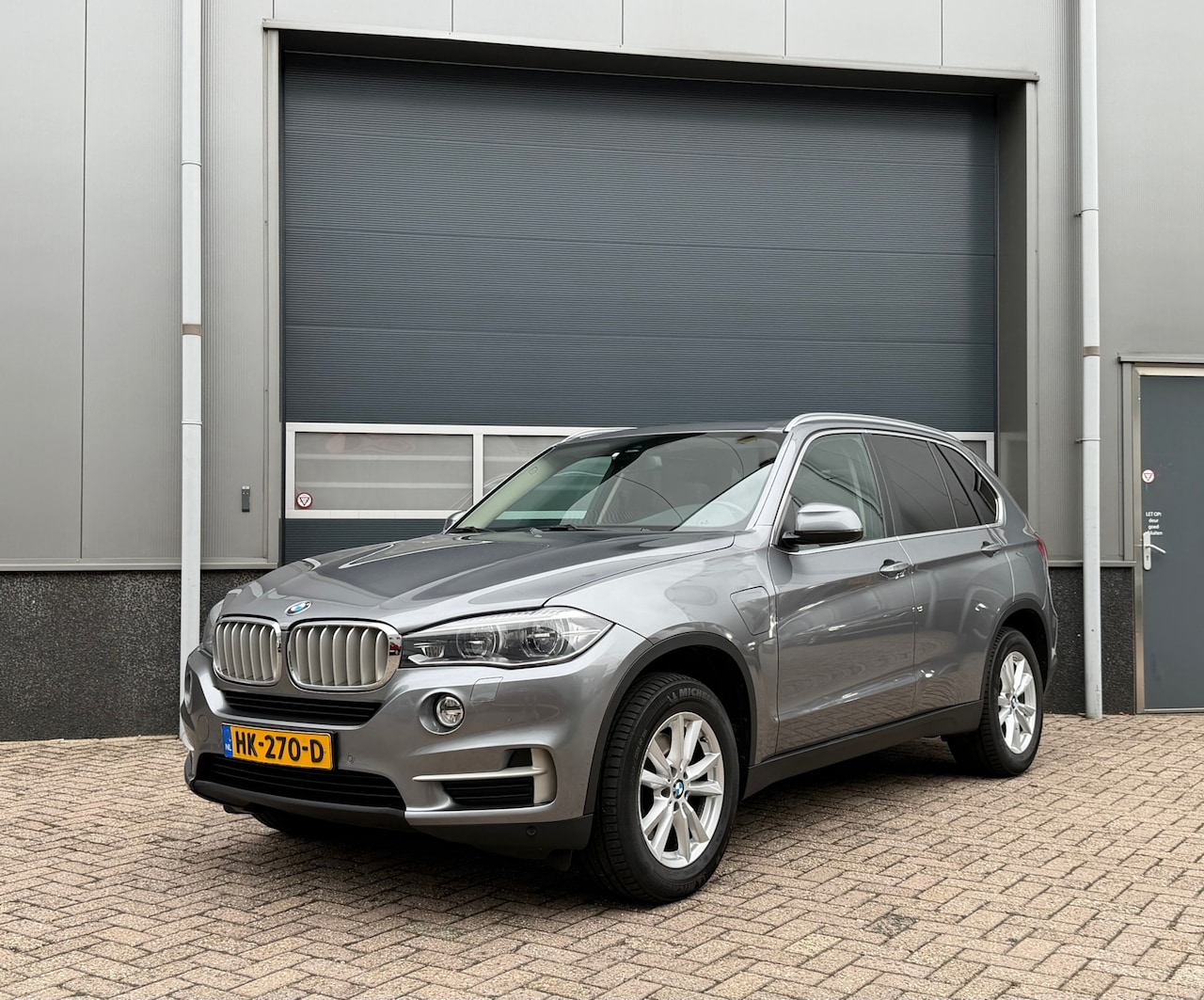 BMW X5 - XDrive40e iPerformance High Executive bj.2015 Pano|Navi|Nap. - AutoWereld.nl