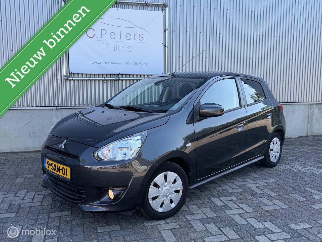 Mitsubishi Space Star - 1.2 80pk Invite 2014 5deurs / Airco / 86.000km NAP - AutoWereld.nl