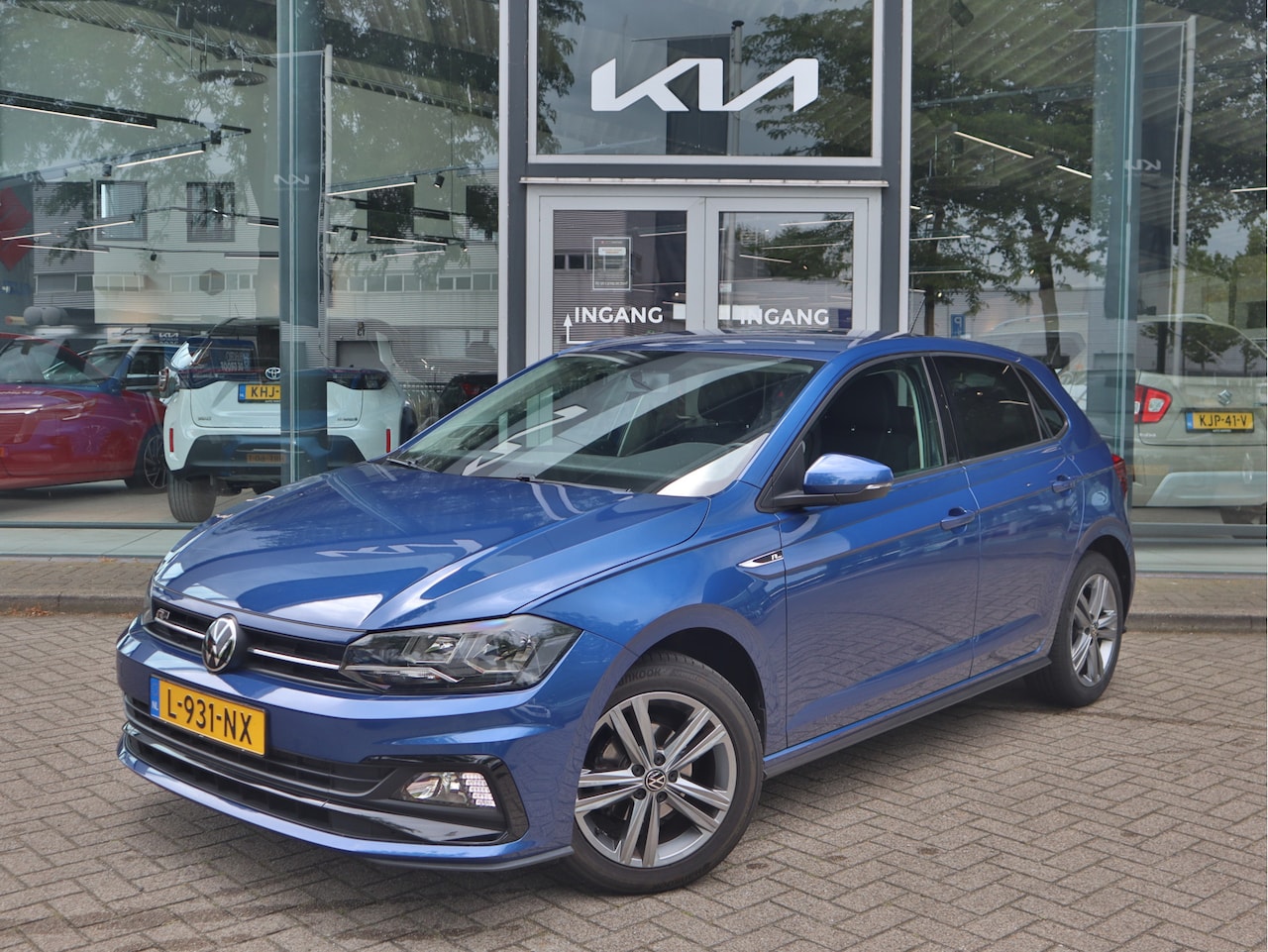 Volkswagen Polo - 1.0 TSI R-Line Edition | Airco | Navigatie | 16" LMV | Adaptieve Cruise Control | - AutoWereld.nl
