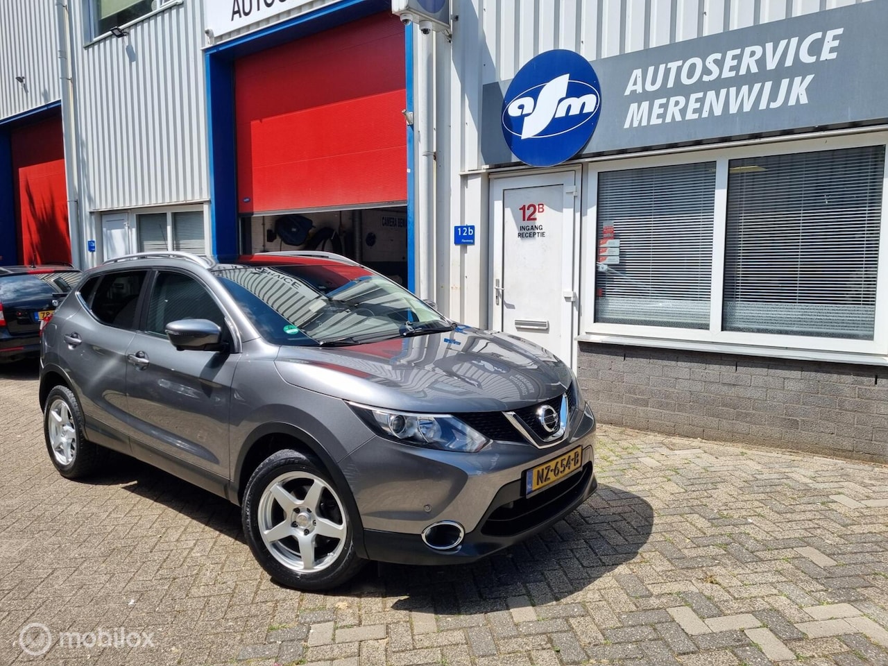 Nissan Qashqai - 1.2 N-Connecta 360 camera - AutoWereld.nl