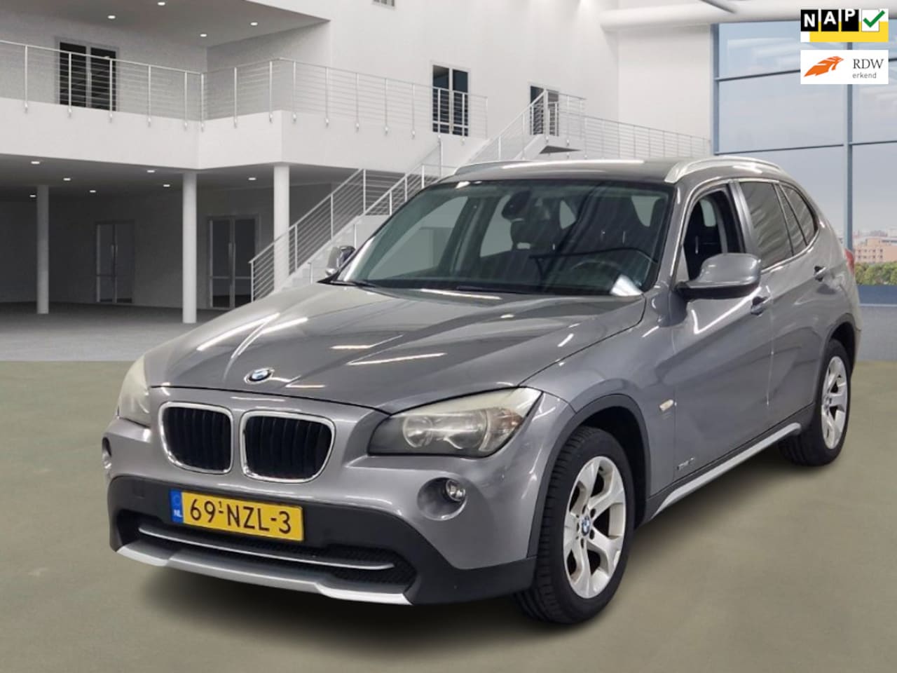 BMW X1 - SDrive18i|AUT|TREKHAAK|PSENSOREN|AIRCO|CRUISE|VAKANTIE KLAAR - AutoWereld.nl