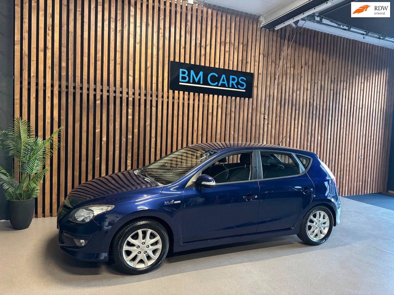 Hyundai i30 - 1.4i i-Motion Airco, PDC, New APK - AutoWereld.nl